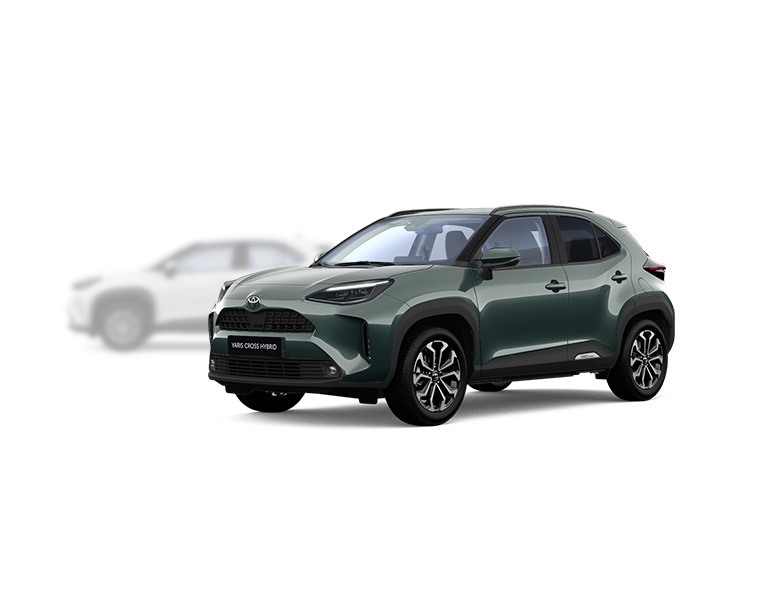 Seitlicher Blick auf einen weißen Toyota Yaris Cross mit schwarzem Seitenschutz, im Hintergrund ist ein dunkel lackierter Yaris Cross verschwommen erkennbar