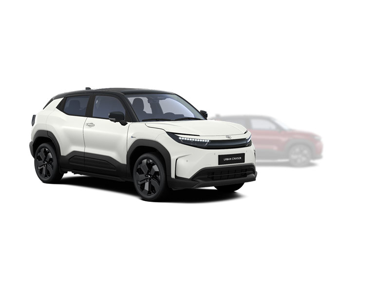 Weißer Toyota Urban Cruiser Lounge in seitlicher Sicht, im Hintergrund ist ein verblasster dunklerer Toyota Urban Cruiser Lounge mit Allradantrieb zu erkennen