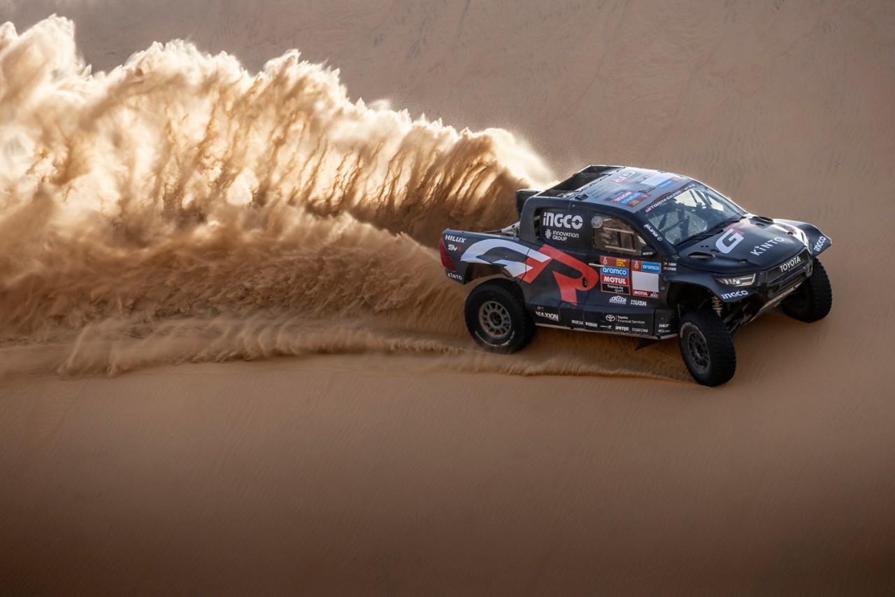 Rally car drifting in the desert